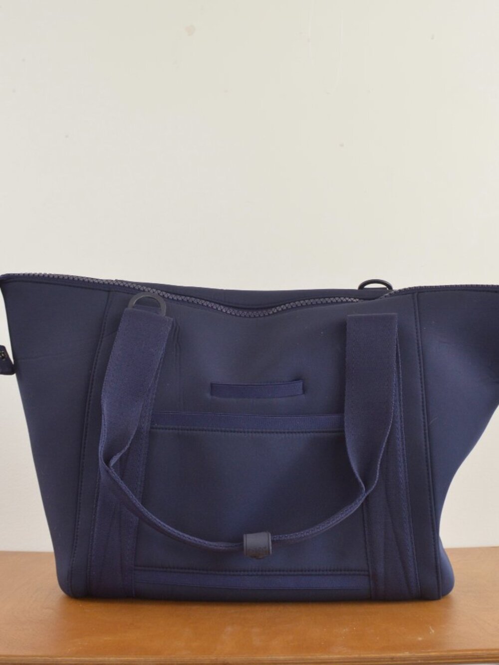 dagne dover medium landon neoprene carryall bag in navy